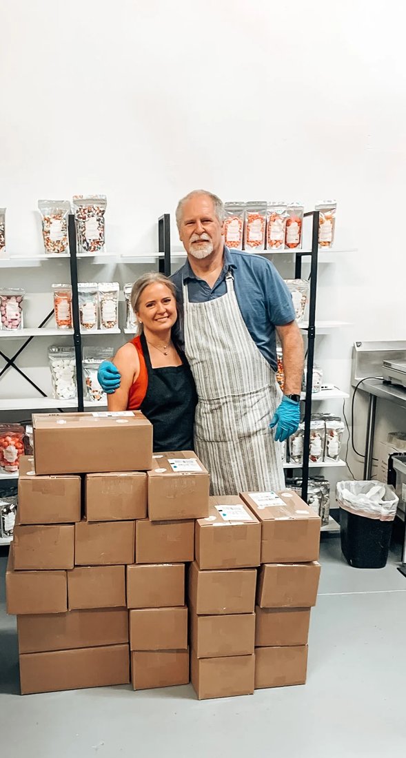 Danielle and Dan with a stack of orders at the Tahoe Treats shop